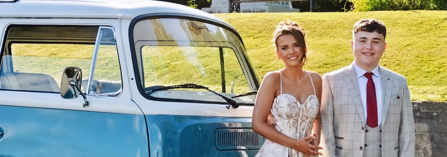 Close-up of the blue and white VW camper van at a school prom in Lancashire