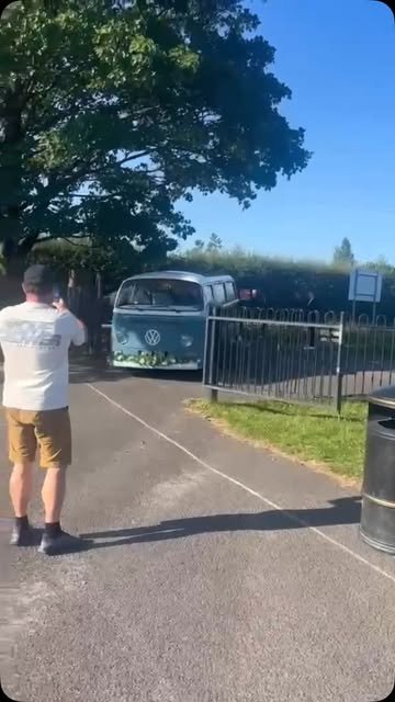 Rob arriving at a Lancashire wedding venue with the blue and cream VW camper wedding car